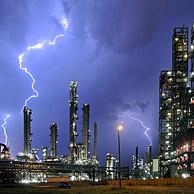 Lightning during thunderstorm above petrochemical industry in the Antwerp harbour, Belgium